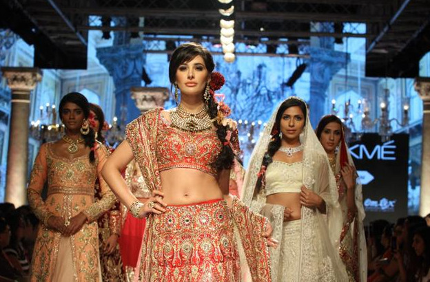 Nargis Fakhri walks the ramp for designer Suneet Varma at Lakme Fashion Week