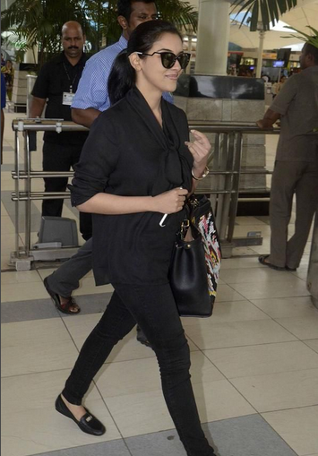 Asin snapped at airport