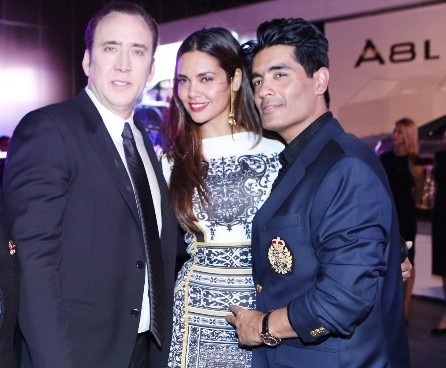 Esha Gupta with Hollywood actor Nicolas Cage at the launch of Audi A8 L car in Dubai