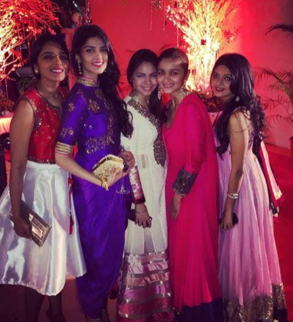 Alia Bhatt poses for ths hutterbugs at her best friend's wedding