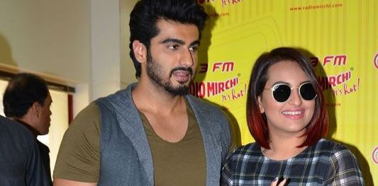 Sonakshi Sinha and Arjun Kapoor pose for the shutterbugs at a radio station