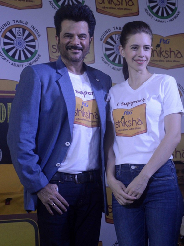 Anil Kapoor and Kalki Koechlin pose for the shutterbugs at P&G Shiksha event