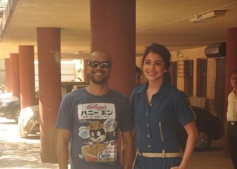 Anushka Sharma and Neil Bhoopalam pose for the shutterbugs outside the radio station