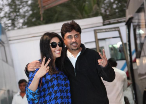 Asin poses with director Umesh Shukla
