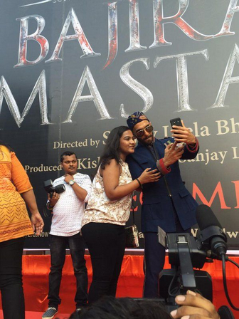 Ranveer Singh clicks a selfie with a fan