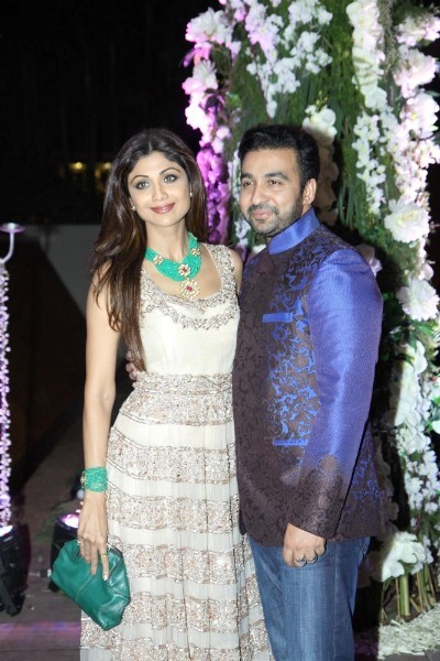 Shilpa Shetty poses with her husband at Manish Malhotra's niece Riddhi's sangeet function