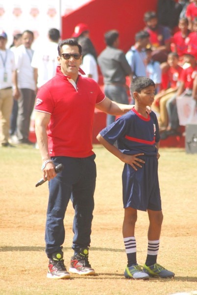 Salman Khan at the launch of Young Champs by Reliance Foundation with a kid