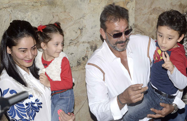 Sanjay Dutt with his wife and kids at the special screening of 'PK'