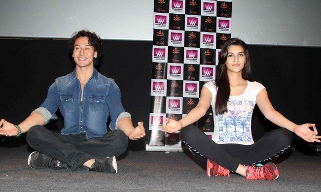 Tiger Shroff and Kriti Sanon performing Yoga at Subhash Ghai's institute